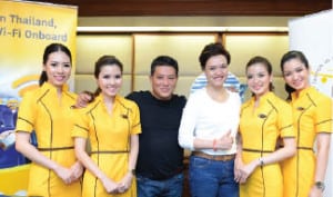 Nok Air’s CEO Patee Sarasin and Thaicom CEO Suphajee Suthumpun with Nok Air staff after announcing their in-flight connectivity partnership. Photo courtesy of Nok Air.