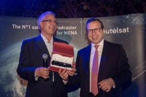 : Mohamed Said Zerari (left), OSN, receiving Eutelsat's special award from Ali Korur (right), CEO of Eutelsat's Middle East. Photo: Eutelsat