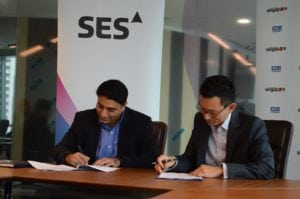 Left to right: Deepak Mathur, senior vice president of commercial, Asia-Pacific and the Middle East at SES and Beh Kian Teik, Executive Director at EDB’s OSTIn signing the partnership.