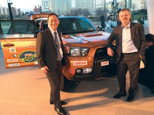 Ken Lee, Intelsat's senior vice president of space systems and Thierry Guillemin, Intelsat's executive vice president and chief technical officer, with the Kymeta connected test car. 