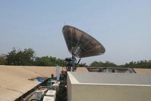 Satellite dish on a roof in Ghana. Photo: Gazprom Space Systems
