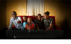 Family watching TV. Photo: Azuri Technologies