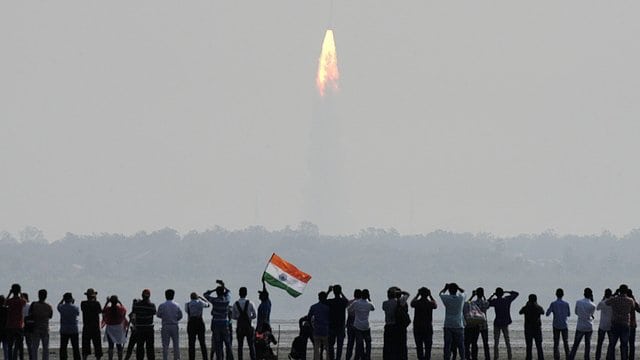Crowd watches ISRO's PSLV-C37 launch.
