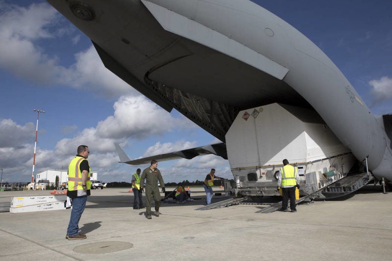 NASA's TDRS-M satellite arrives inside its shipping container at Space Coast Regional Airport in Titusville, Florida. Photo: NASA.