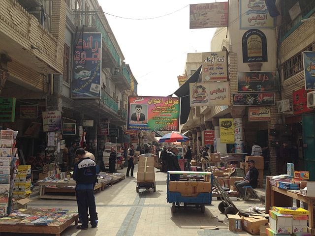 Street in downtown Baghdad, Iraq. Photo: Wikimedia. 