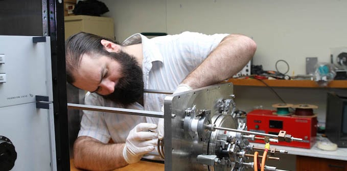 Patrick "Paddy" Neumann works on the Neumann Drive. Photo: Neumann Space. 