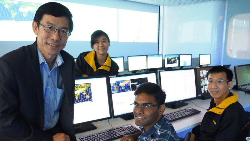 Associate Professor Law Kay Soon, research engineer Chin Shi Tong, NTU undergraduate A Saravanan, and PhD student Charlie Soon at the NTU Mission Control Room, where X-Sat satellite operations are controlled daily. Photo: National Singapore University. 