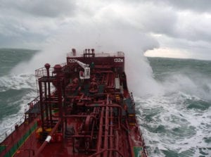 A De Poli Tankers vessel crashes over waves at sea. Photo: De Poli Tankers.