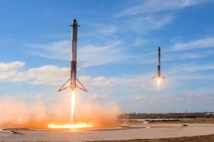 The two Falcon Heavy boosters landing side by side after the first test flight of the new launch vehicle. Photo: SpaceX
