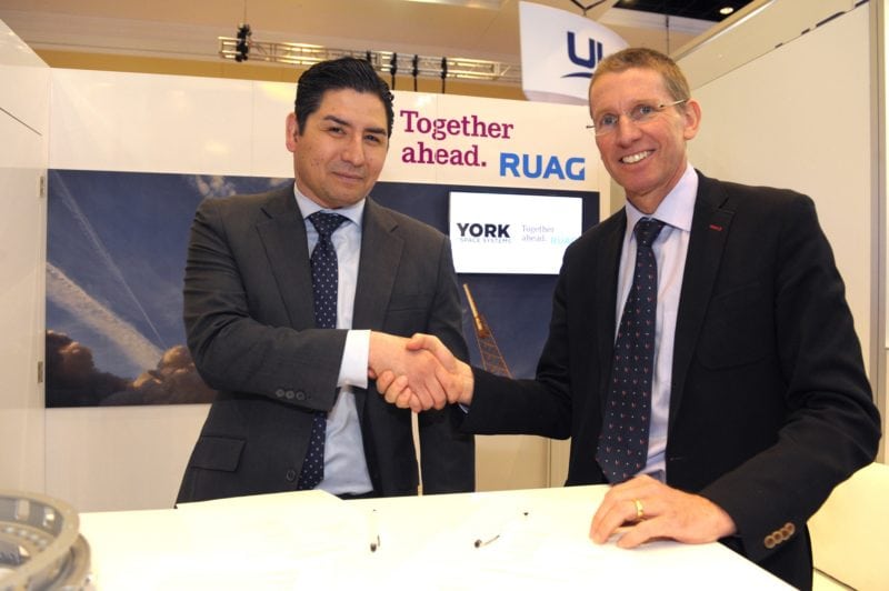 Dirk Wallinger, York Space Systems chief executive, and Peter Guggenbach, RUAG Space chief executive signing the agreement.
