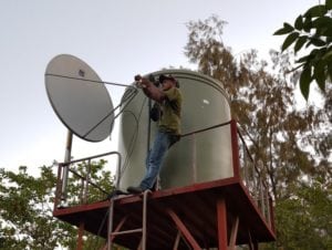 Installation of VSAT terminal at SAMES, Dili. Courtesy of Kacific Broadband Satellite.