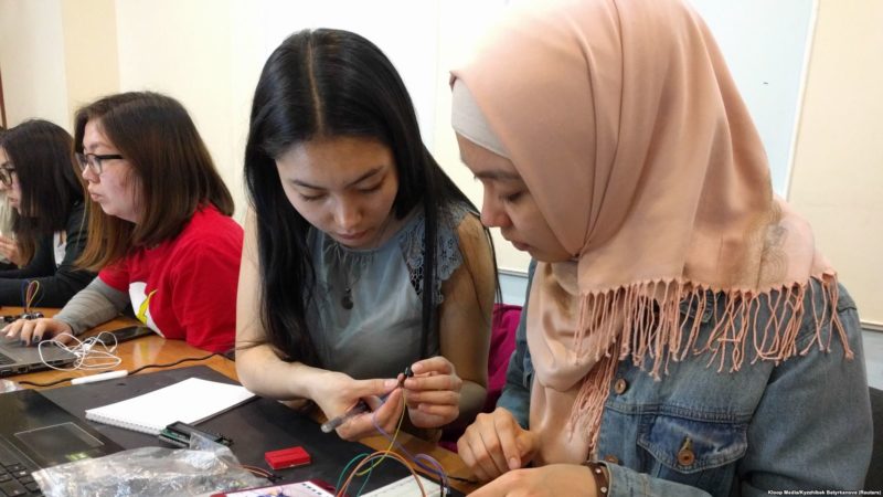 Young women in Kyrgyzstan participate in a project run by Kloop Media, a local media group, to build the country's first satellite in Bishkek, Kyrgyzstan, June 4, 2018. Photo: Kloop Media/Kyzzhibek Batyrkanova (Reuters)