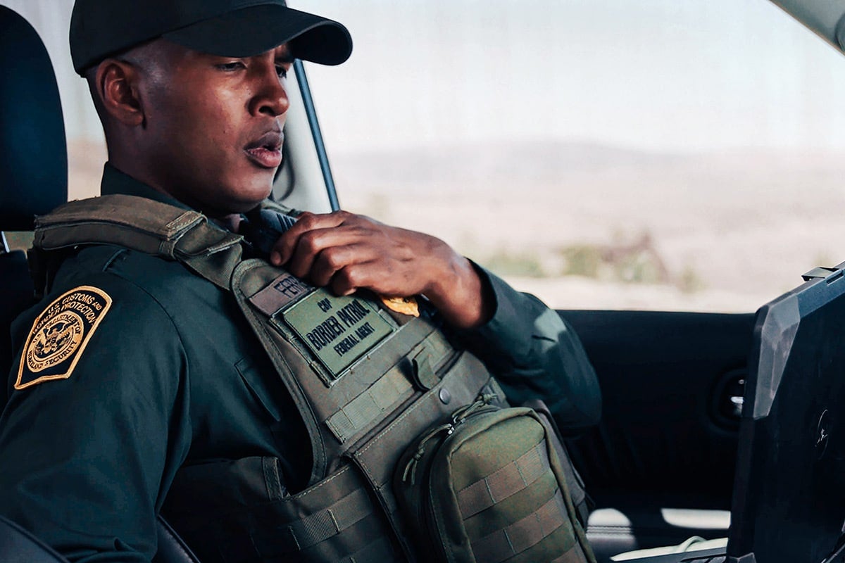 Border control officer. Photo: Intelsat